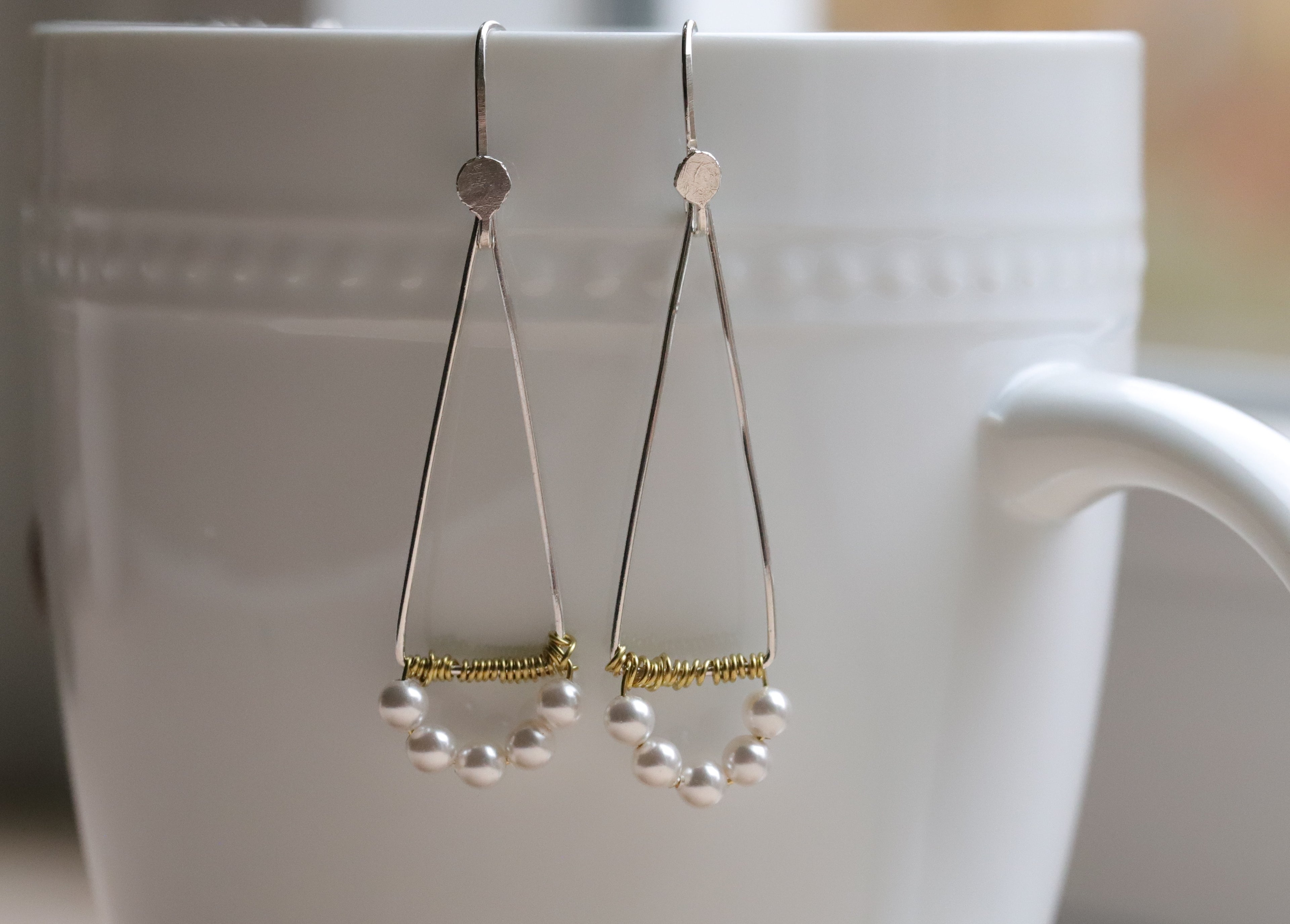 Triangular touch of Pearl